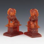 Pair of Vintage Consolidated Faux Amber Chinese Foo Lion Figurines