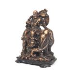Chinese Carved Stone Immortal Lan Caihe on Elephant Grouping, on Carved Wood Stand