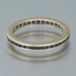 Ladies' Gold and Blue Sapphire Eternity Band