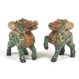 Two Chinese Sancai Glazed Ceramic Mythical Qilin Sculptures