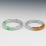 Two Carved Jadeite Bangle Bracelets