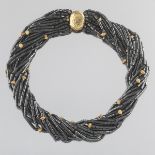 Hematite and Gold Torsade Necklace