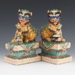 Chinese Pair of Porcelain Glazed Temple Foo Dogs on Pedestals