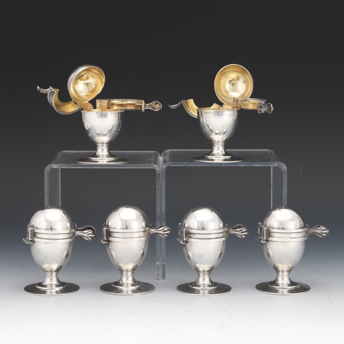 Six Edwardian Sterling Silver with Gold Wash Egg Holders with Topping Brackets - Image 6 of 8