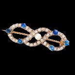 ANTIQUE PEARL, DIAMOND AND SAPPHIRE TWISTED ROBE BROOCH