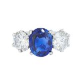 IMPORTANT 4.17 CT BLUE SAPPHIRE AND DIAMOND 3-STONE RING