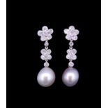 IMPORTANT PAIR OF NATURAL SATWATER PEARL AND DIAMOND DROP EARRINGS