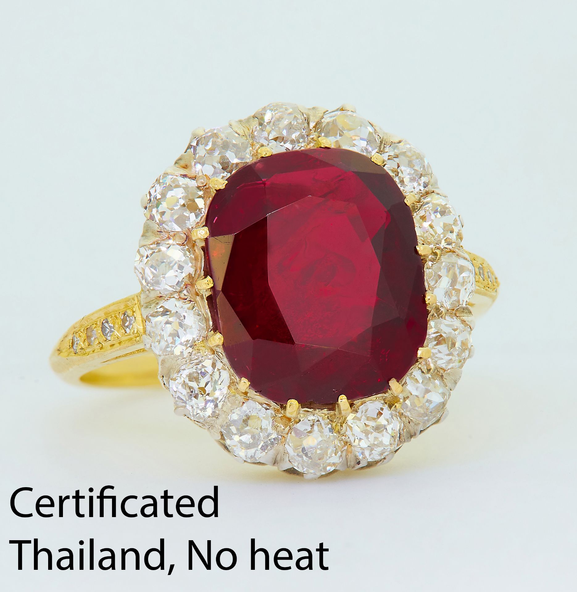 IMPORTANT RUBY AND DIAMOND CLUSTER RING