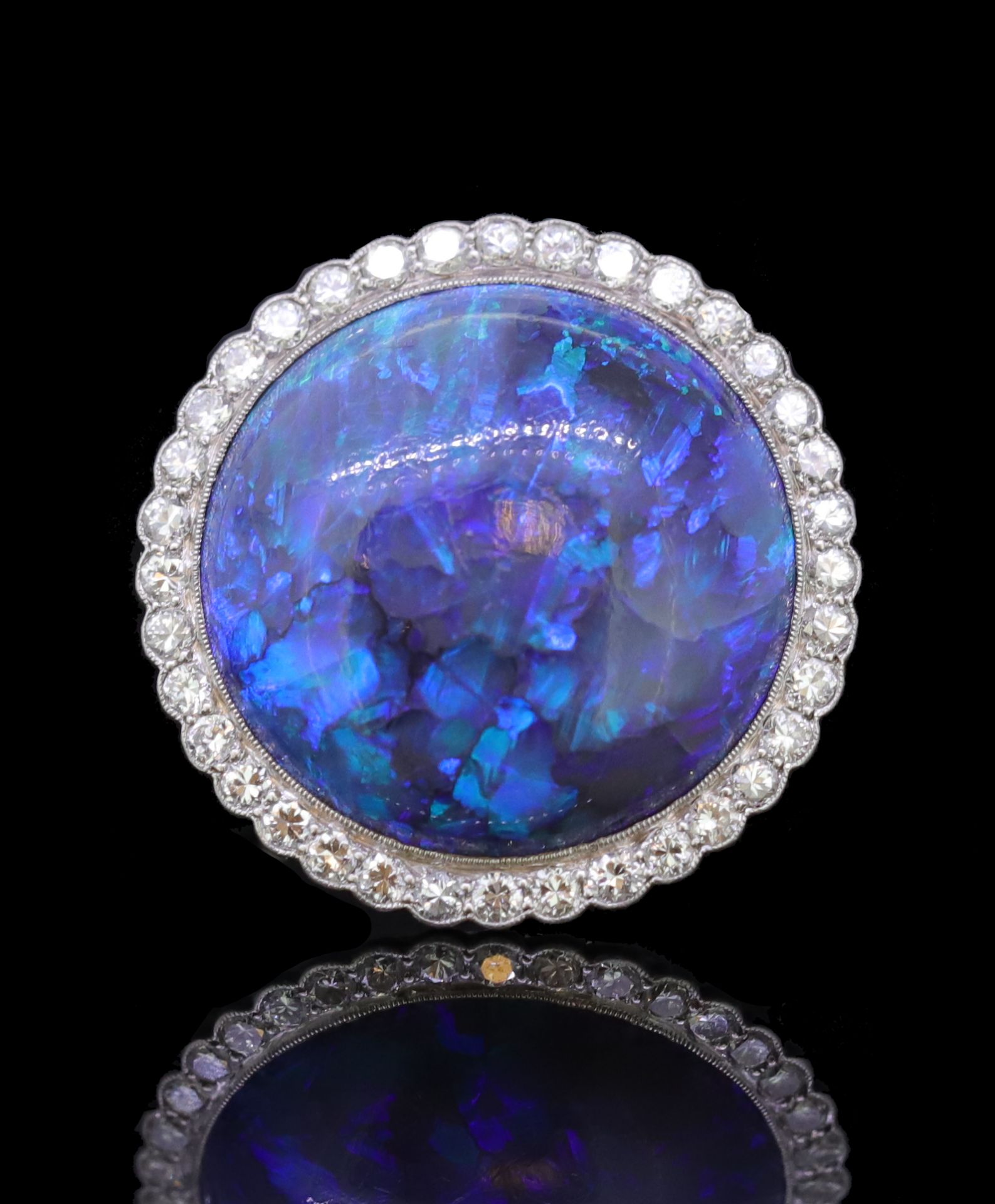 IMPORTANT BLACK OPAL AND DIAMOND CLUSTER RING