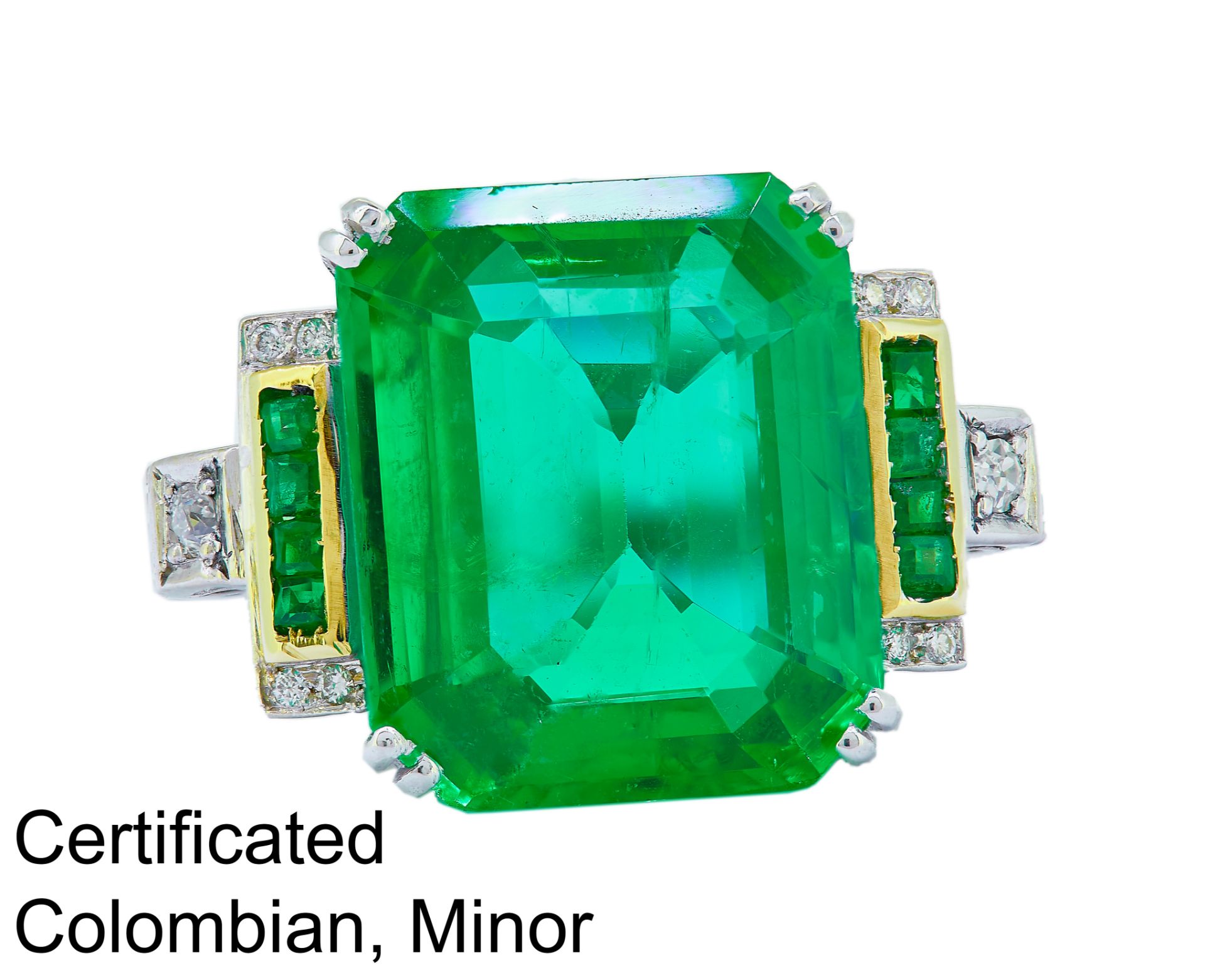 IMPORTANT 9 CT COLOMBIAN EMERALD AND DIAMOND RING