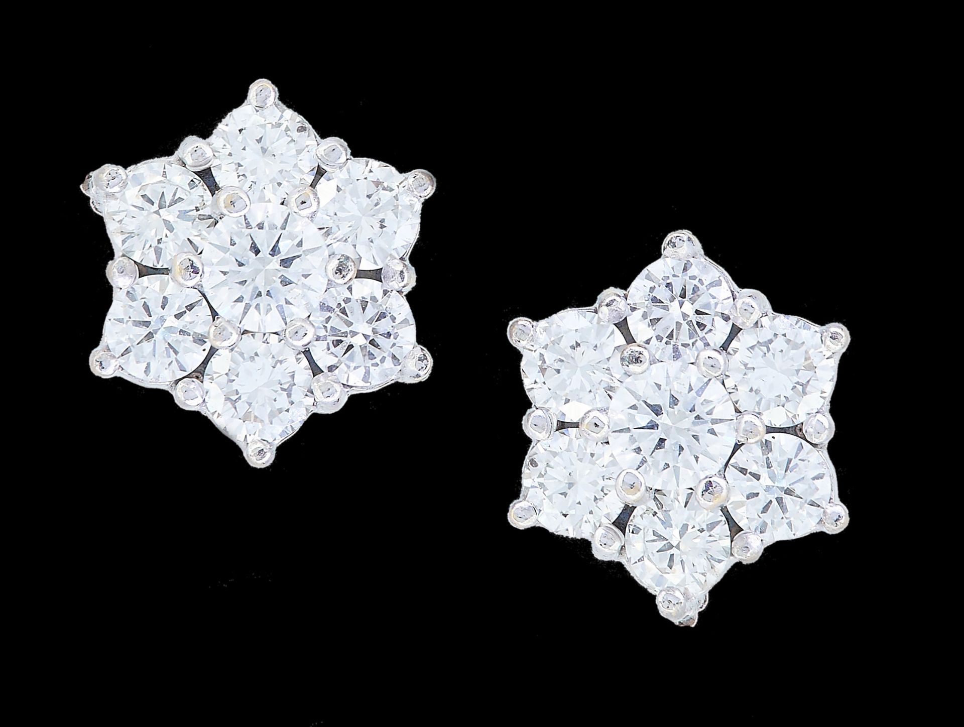 PAIR OF DIAMOND CLUSTER EARRINGS.