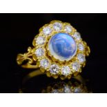 ANTIQUE MOONSTONE AND DIAMOND CLUSTER RING