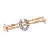 ANTIQUE DIAMOND HORSE SHOE AND RIDING CROP BROOCH