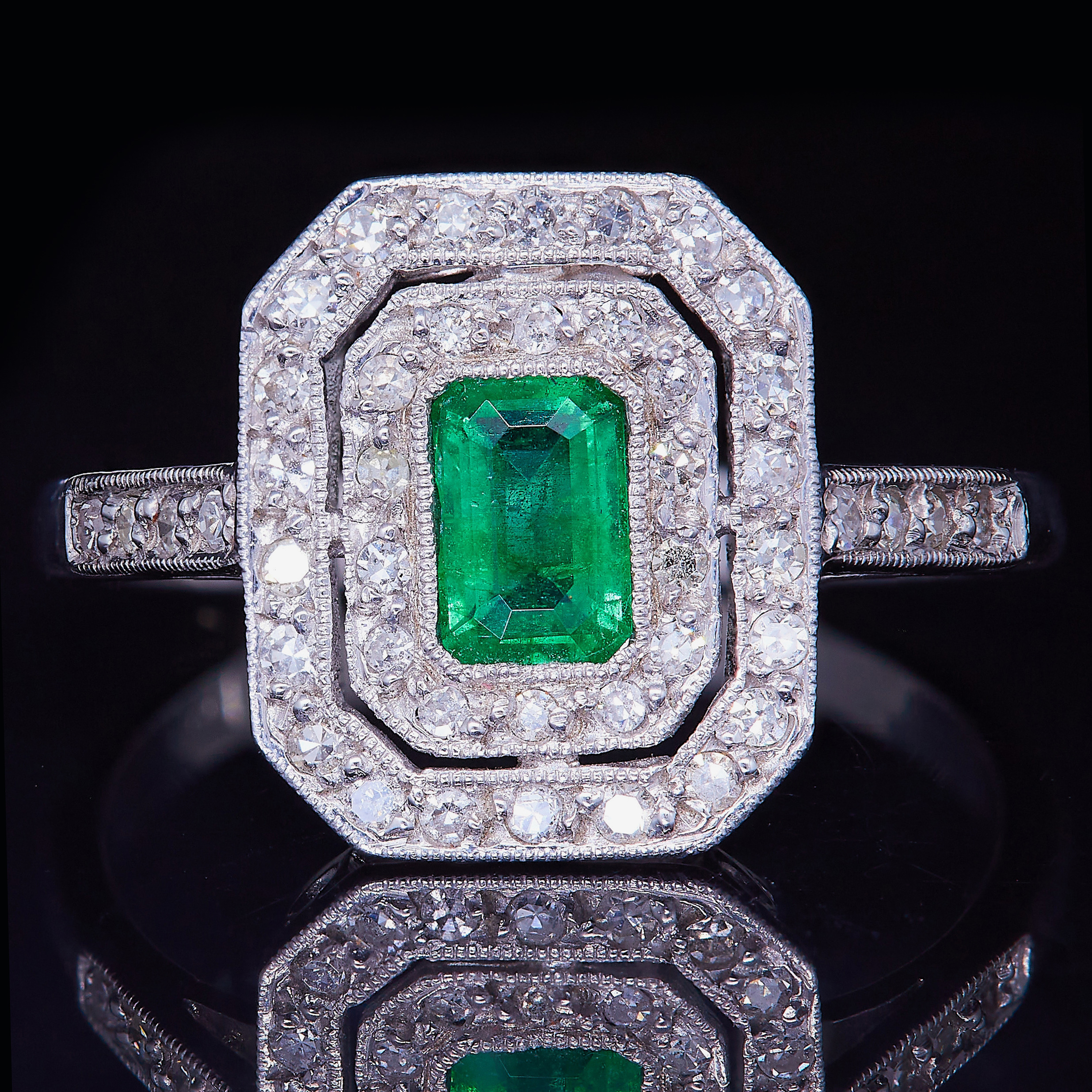 EMERALD AND DIAMOND CLUSTER RING