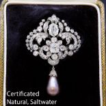 IMPORTANT CERTIFICATED NATURAL SALTWATER PEARL AND DIAMOND DROP BROOCH
