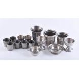 Group of tin vessels