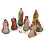 Christi GeburtMasse farbig gefasst, 8 Massefiguren mit Heiliger Familie, den Heiligen