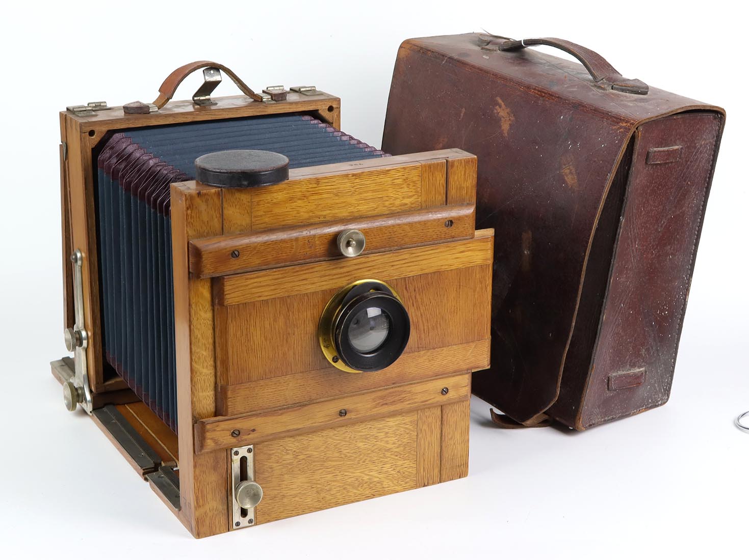 Plattenkamera um 1900Studiokamera rechteckiger Holzkorpus mit Laufboden u. Balg, Objek