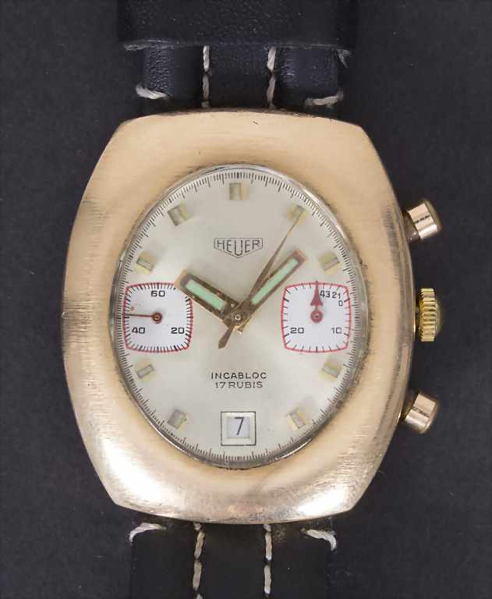 Heuer Chronograph, Schweiz um 1975Gehäuse: Metall vergoldet, mit geschraubtem Stahlbo