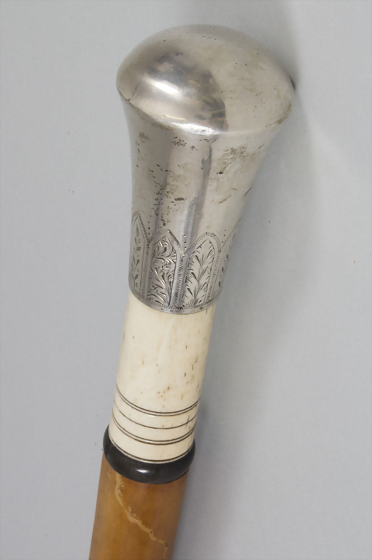 Spazierstock / A walking stick / cane, um 1900Material: Silber, Horn, Elfenbein, Malak