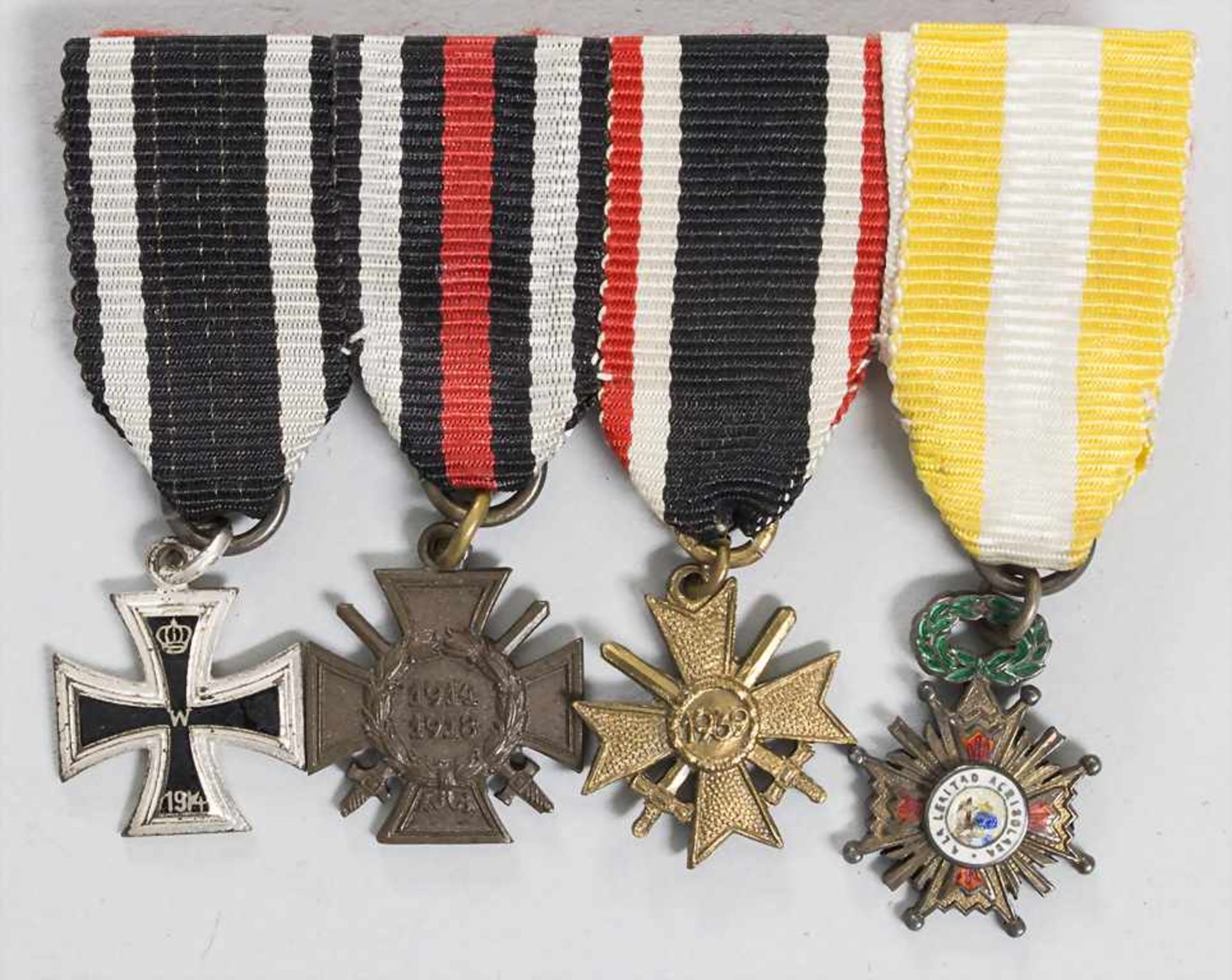Ordenspange mit 4 MiniaturenBestehend aus:* Eisernez Kreuz 1914,* Ehrenkreuz f
