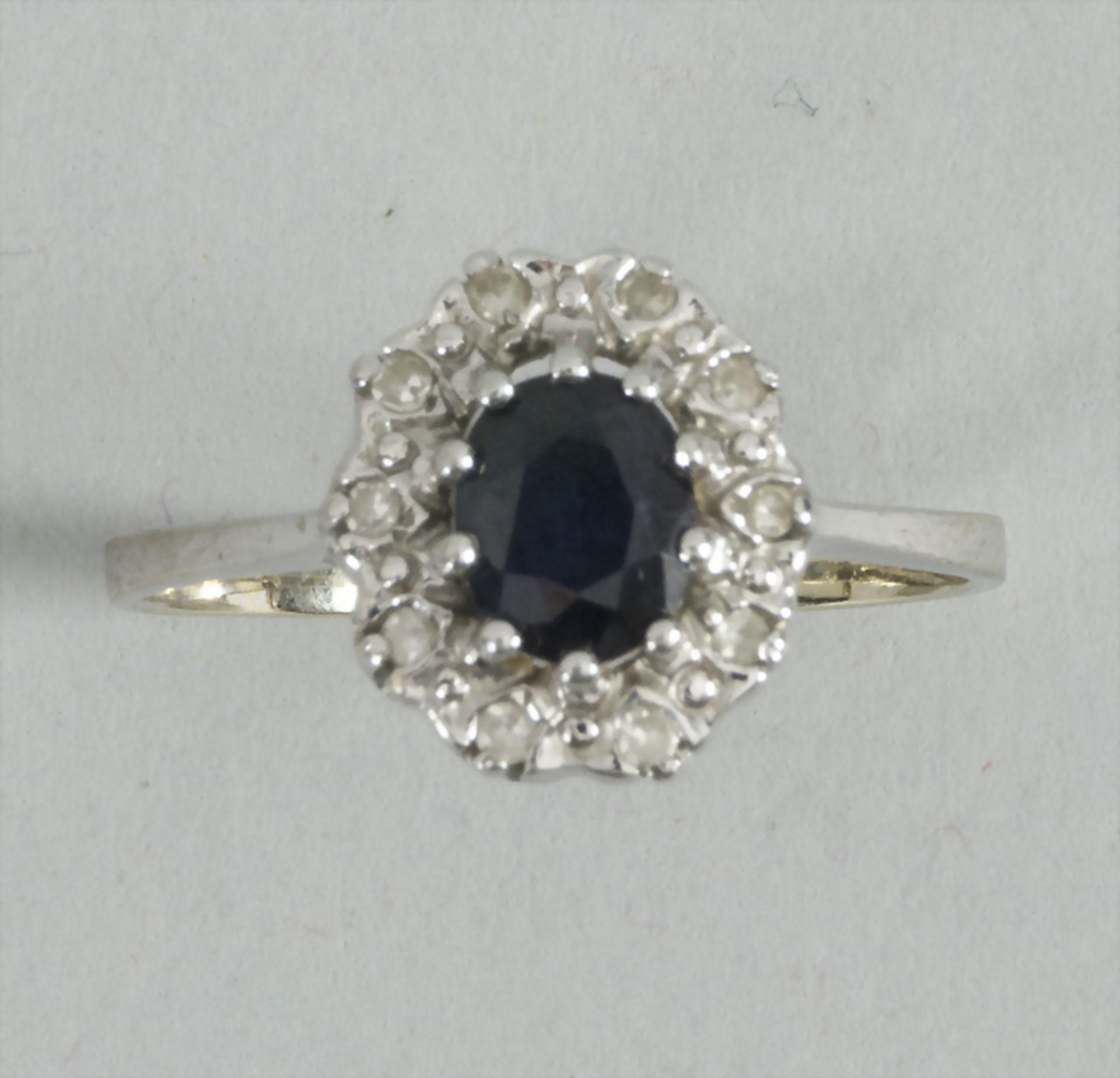 Saphir-Diamant-Ring / A 14k gold ring with sapphire and diamonds