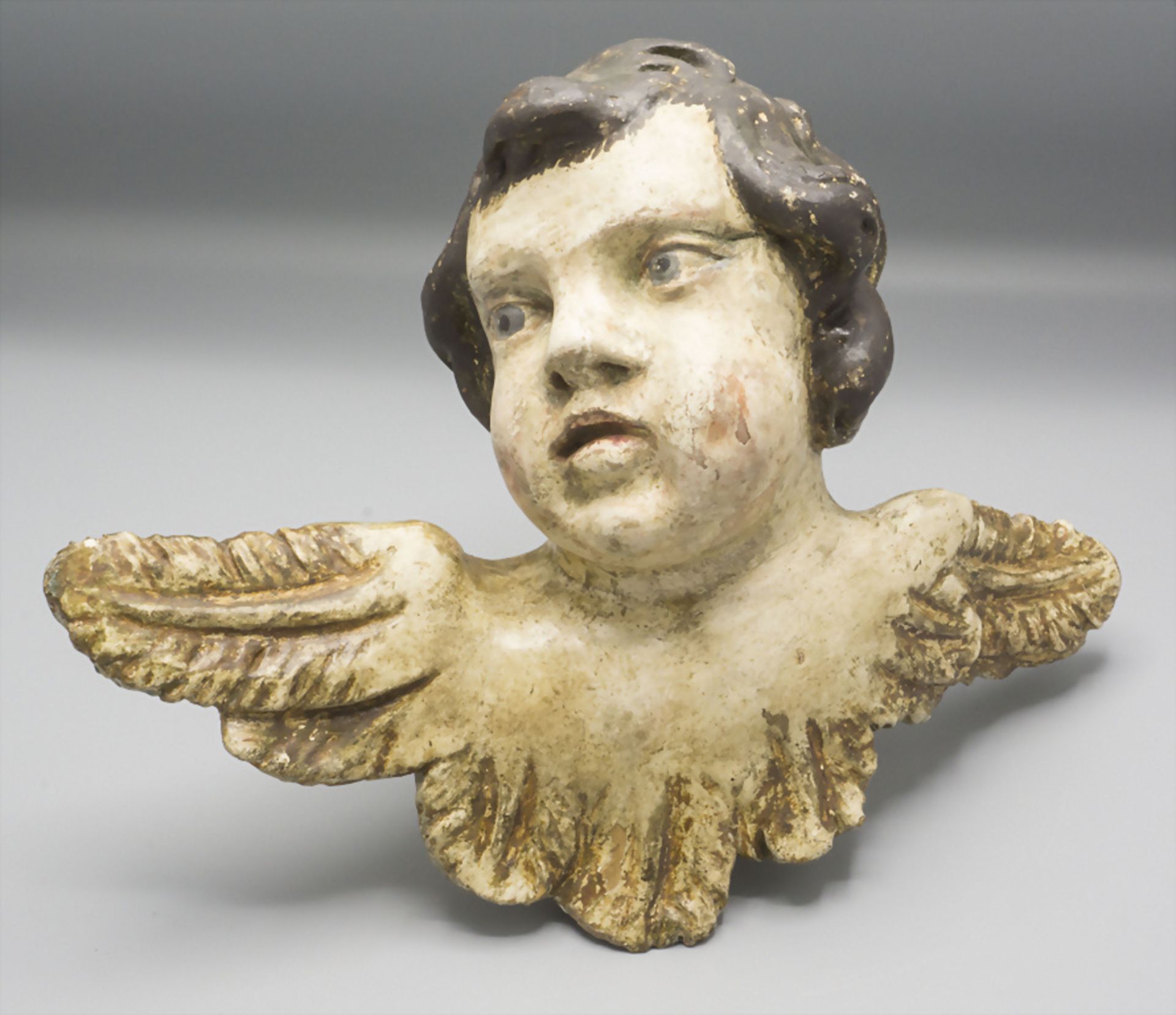 Puttokopf als Hängeskulptur / A head of a putto as hanging sculpture, Süddeutschland, 18. Jh.