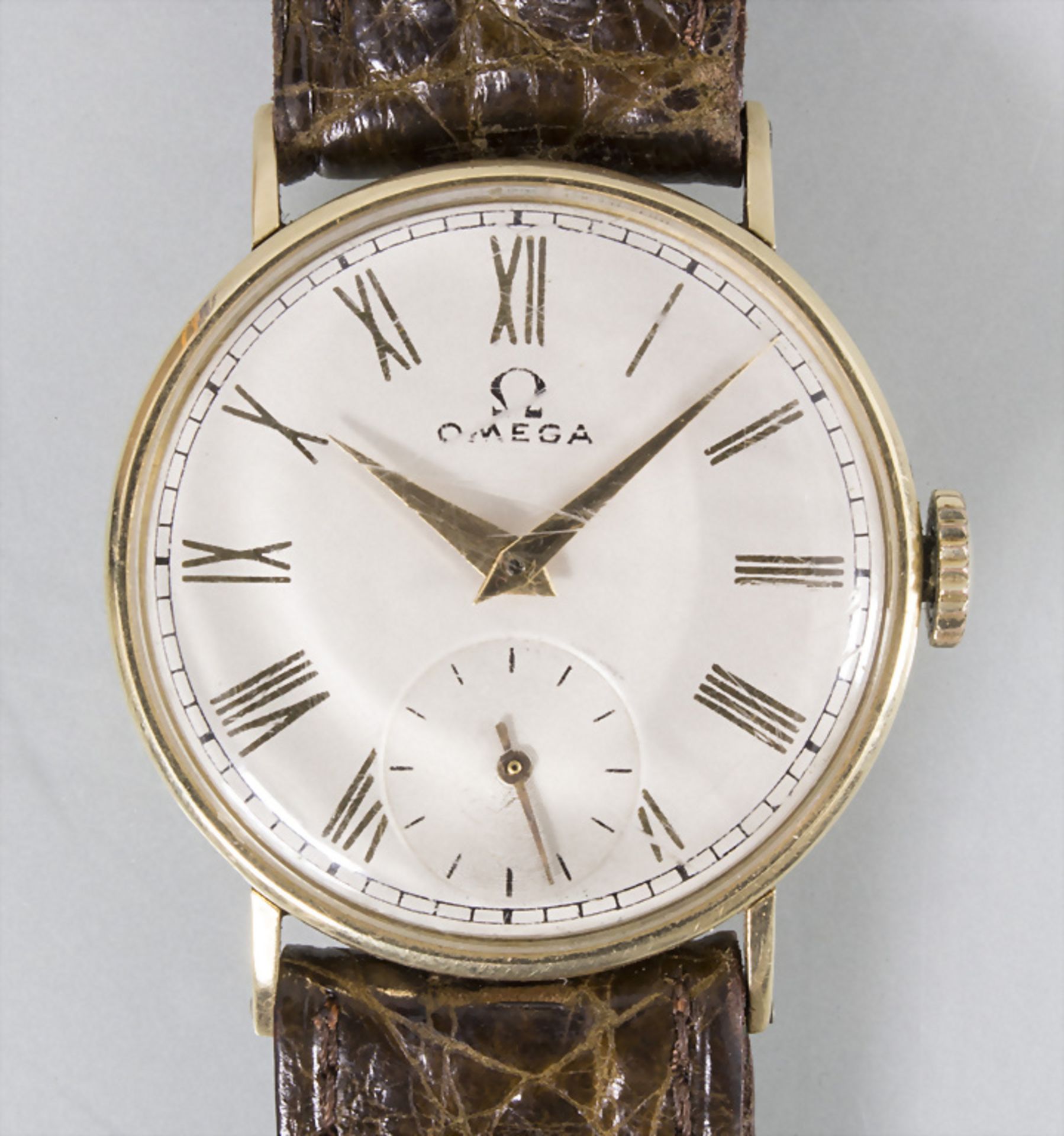 HAU / A 14k gold men's wrist watch, Omega, Schweiz, um 1942