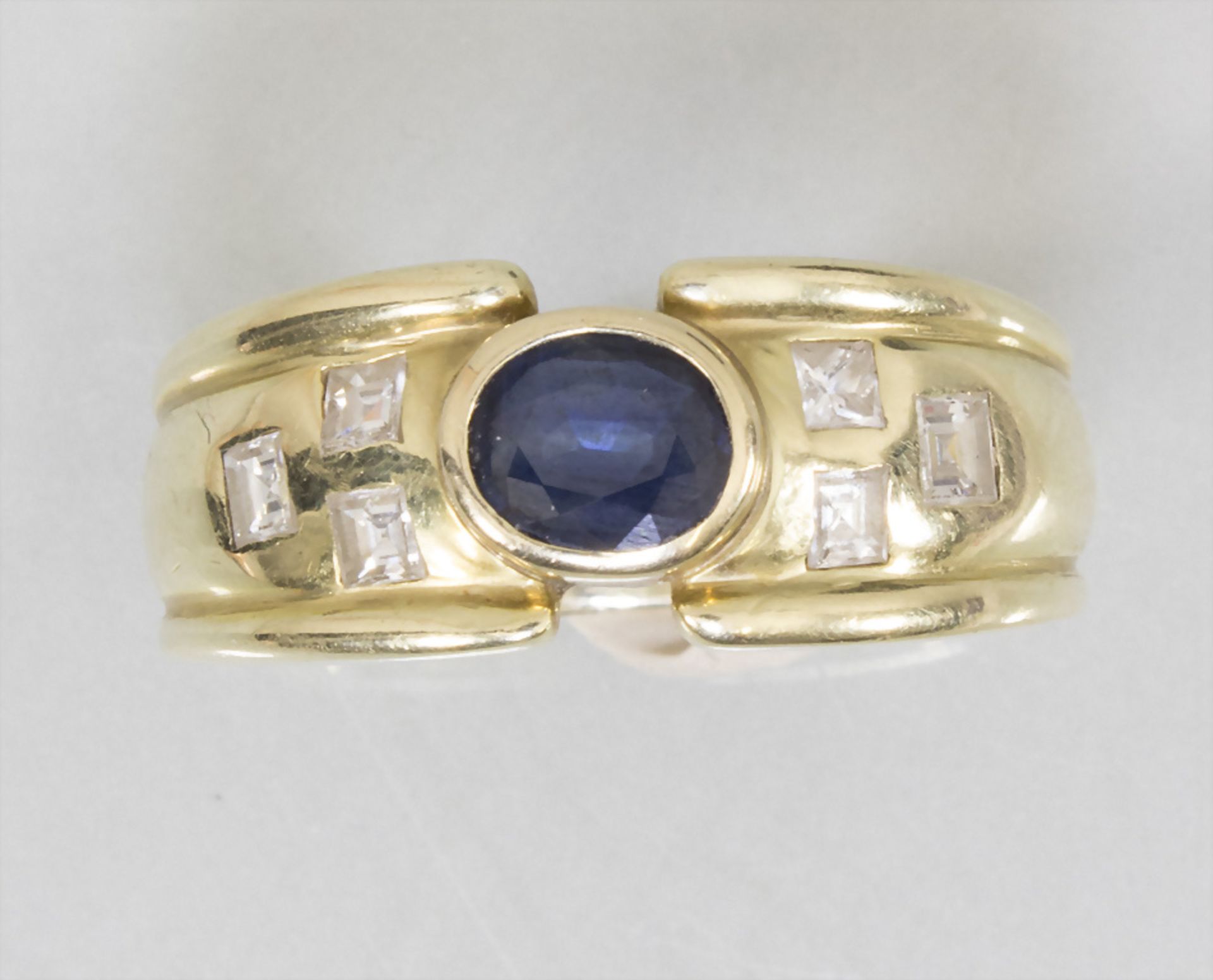 Damenring mit Saphir und Diamanten / A ladies 14k gold ring with sapphire and diamonds