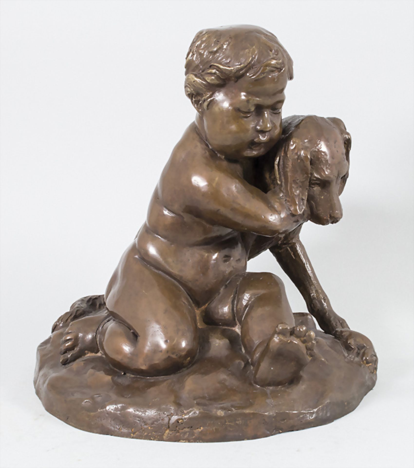 Bronze Figurengruppe Putto mit Setter und Frosch / A figural bronze group of a cherub with a ...