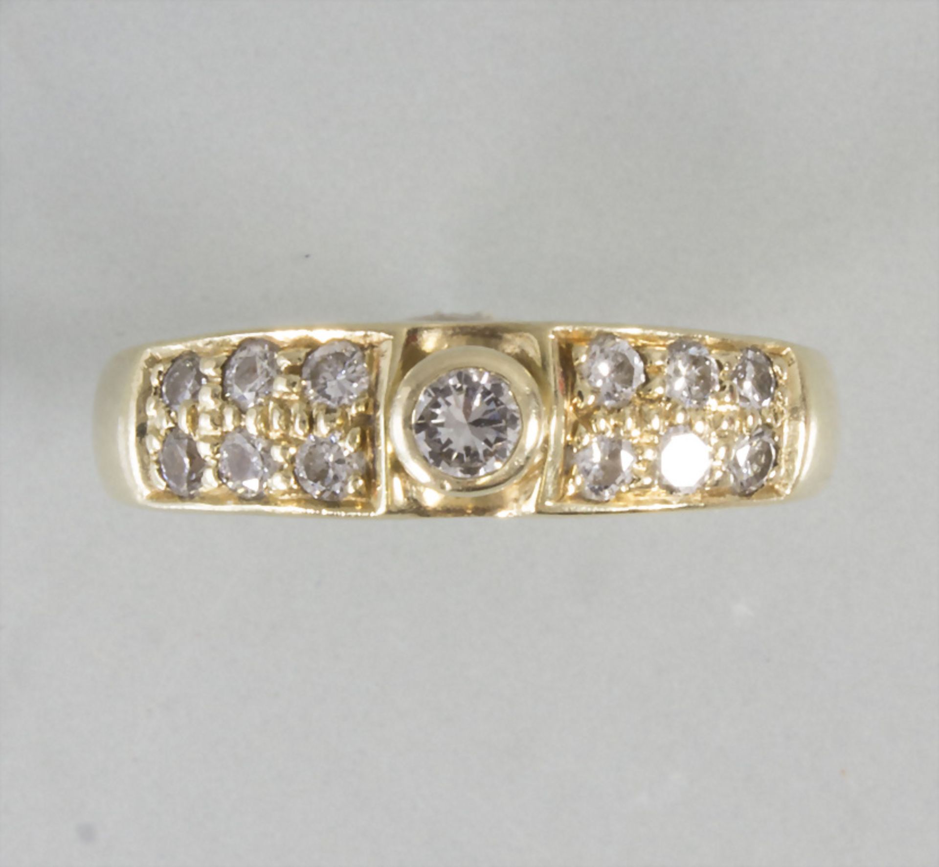 Damenring mit Diamanten / A 14k ladies gold ring with diamonds