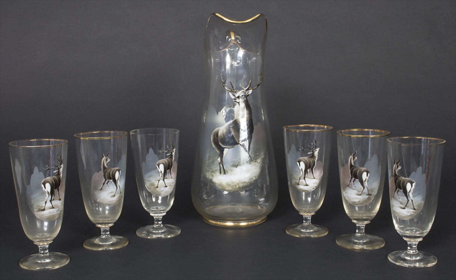 Saftkrug und 6 Gläser mit Hirschmotiven / A decanter and 6 glasses with deer decor, um 1900