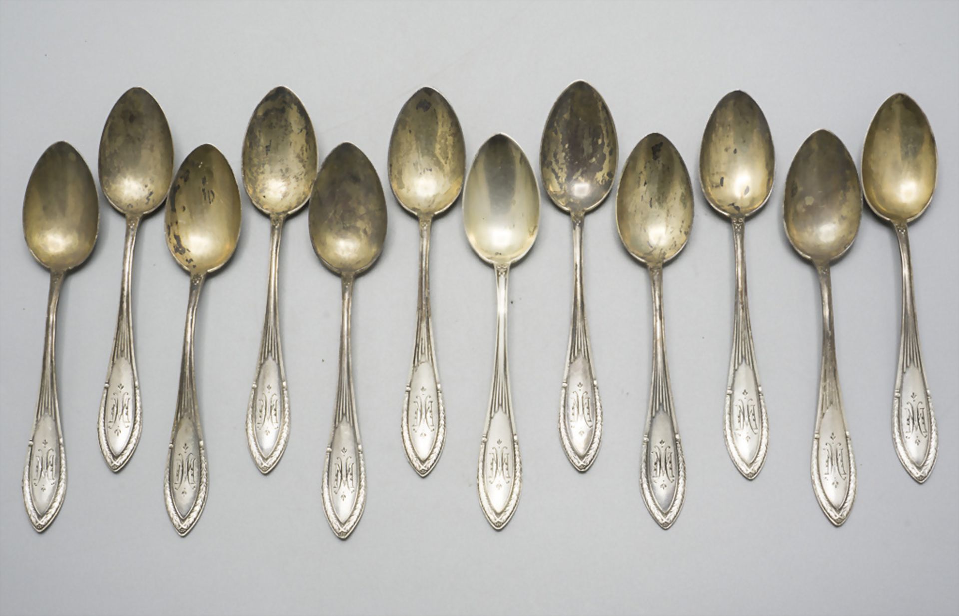 12 Löffel / 12 cuillères en argent massif / A set of 12 silver spoons, Franz Bahner, ...