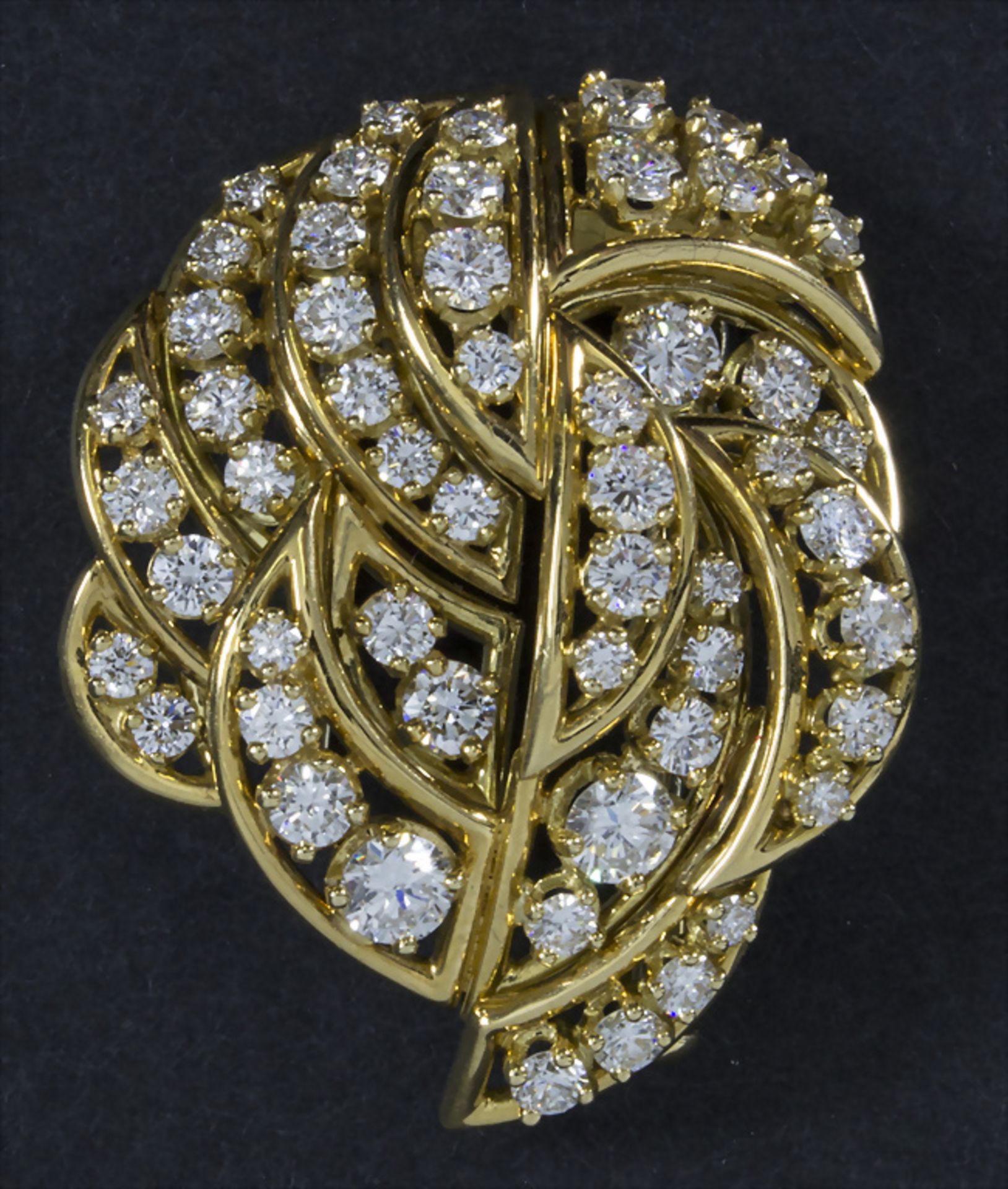 Goldbrosche mit Diamanten / An 18k gold brooch with diamonds, 20. Jh.