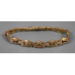 Armband mit Rubinen und Perlen um 1910, Gelbgold gestempelt 333, ca. 10 mm breite Schmuckglieder,