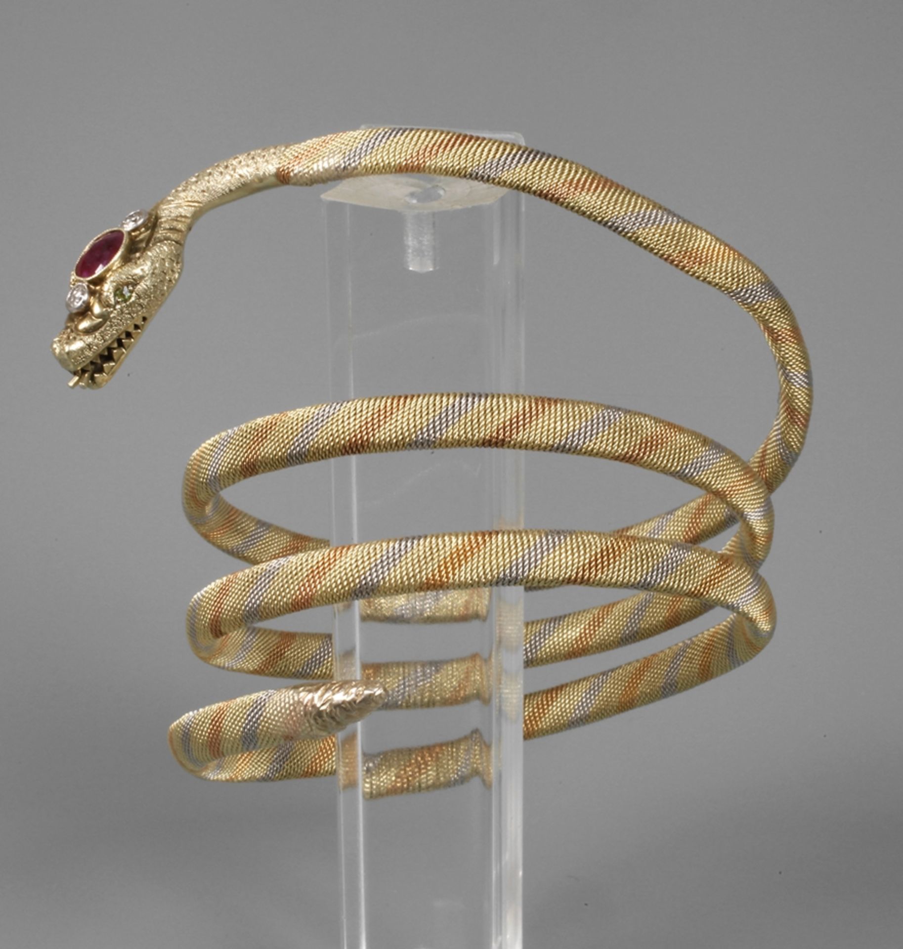 Schlangenarmband um 1920, Weiß-, Rot- und Gelbgold gestempelt 585, fein kordierte, gewundene