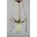 Deckenlampe um 1910, Bronze gegossen und vergoldet, einflammig elektrifiziert, der Lampenschirm