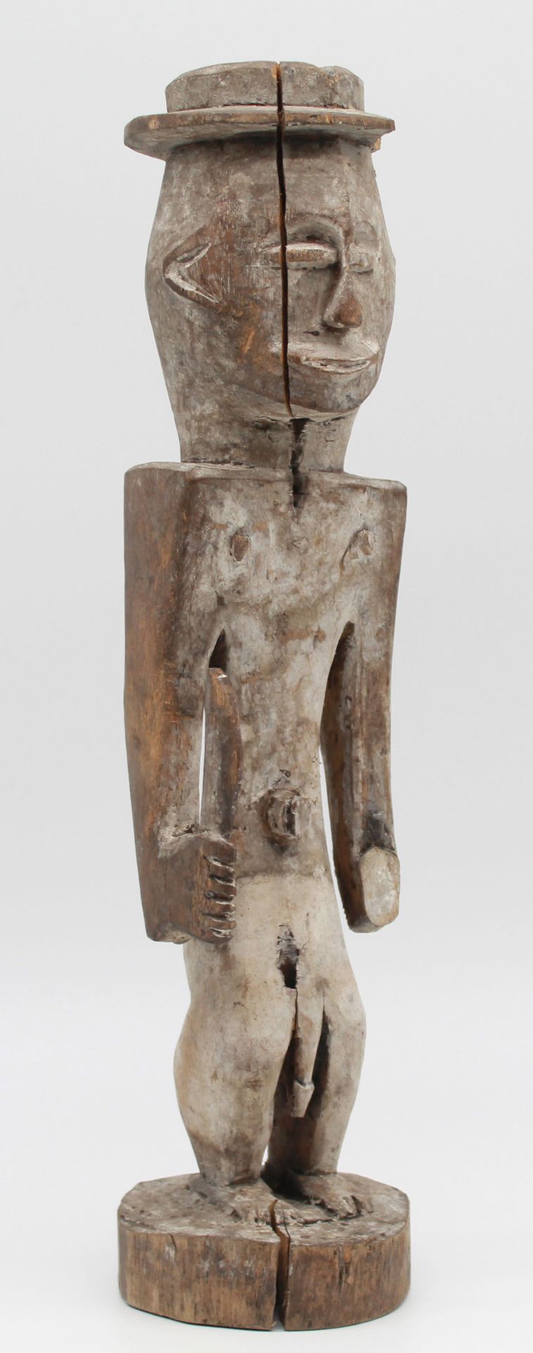 Male figure with sword and western hat. Probably the Congo Basin.