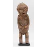 Female shrine figure. Probably Yoruba, Nigeria, West Africa.