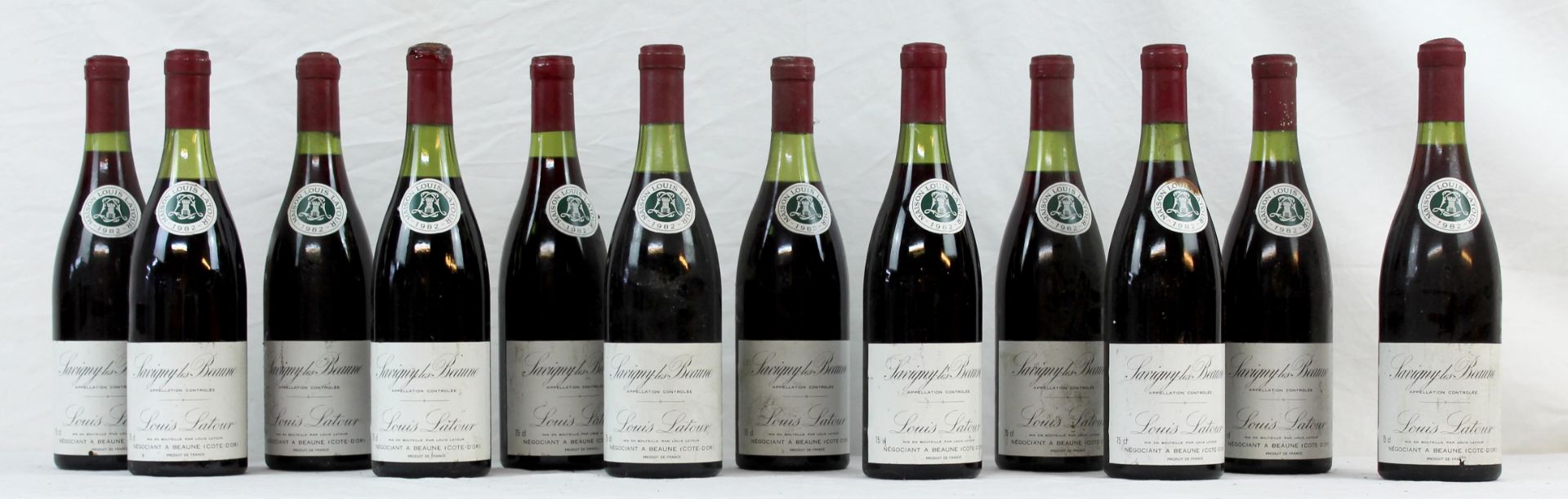 1982 Savigny les Beaune AC. Louis Latour. 12 whole bottles of 75 cl.