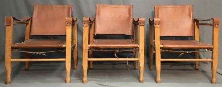 3 Safari Chair. Leder und Holz. Wohl Design von Wilhelm KIENZLE (1886-1958).