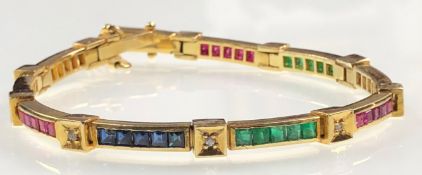 Yellow gold bracelet. Tested 18 carat. Diamonds, sapphires and rubies.