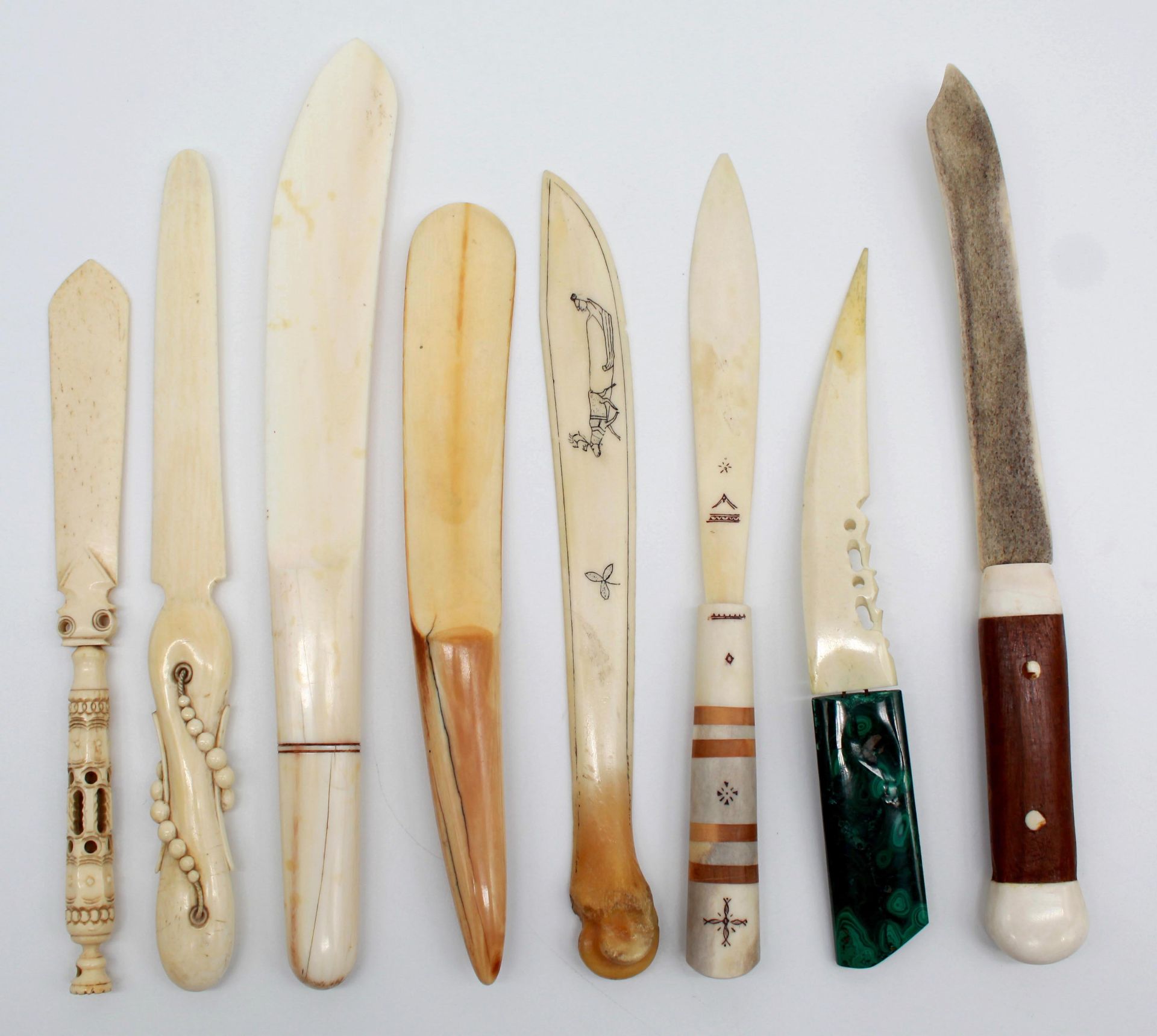 8 letter openers / page turner. Partly also ivory.