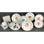 7 Meissen plates. Different decors. Partly with sanding marks.