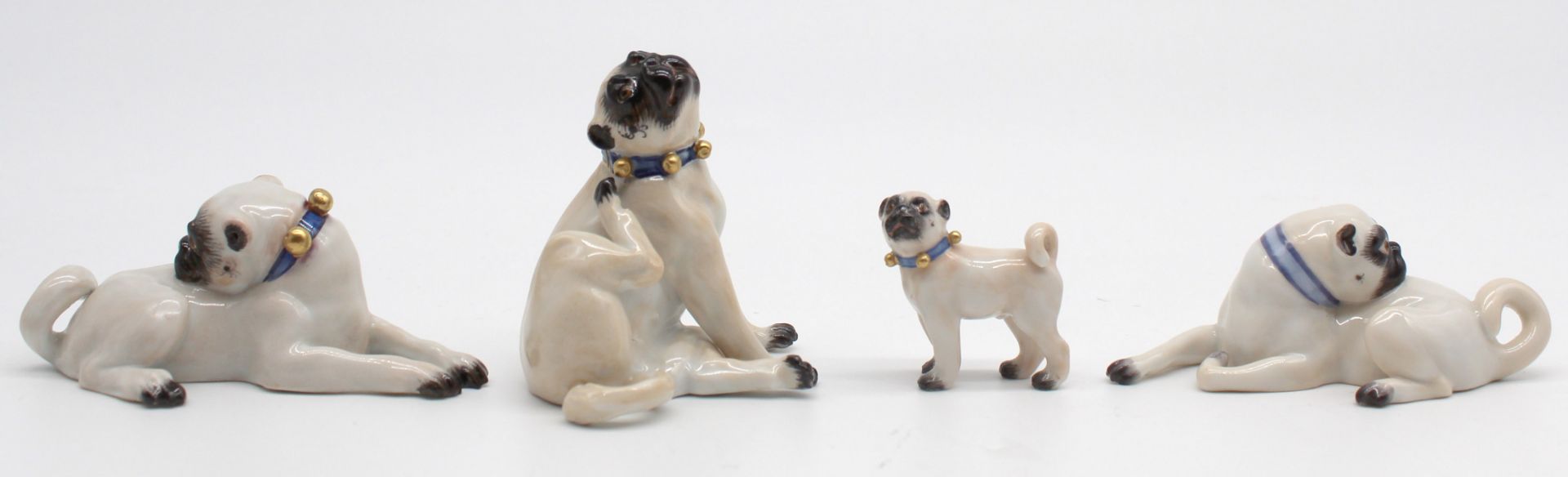 Meissen porcelain. 4 figures, pug. Up to 6 cm high.