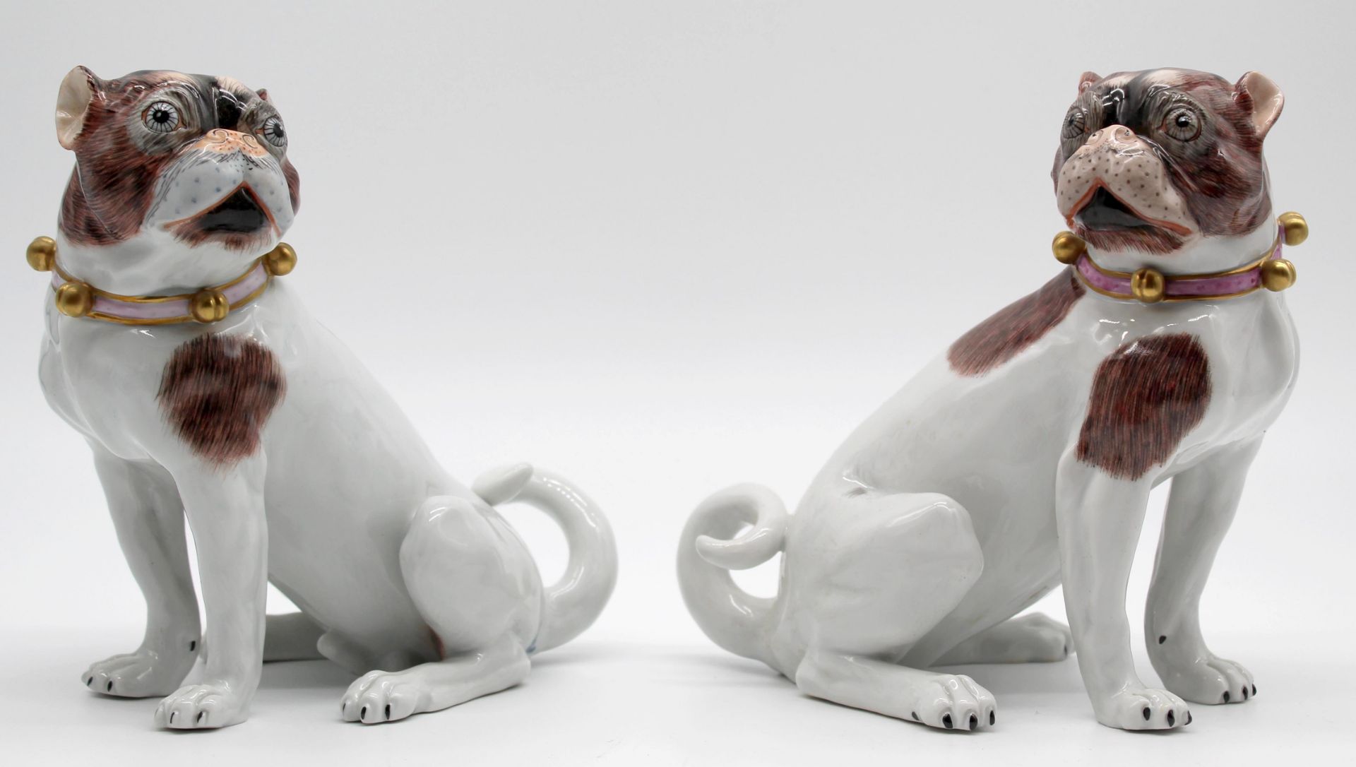 Dresden porcelain. 2 figures. Pug. Each 17.5 cm high.