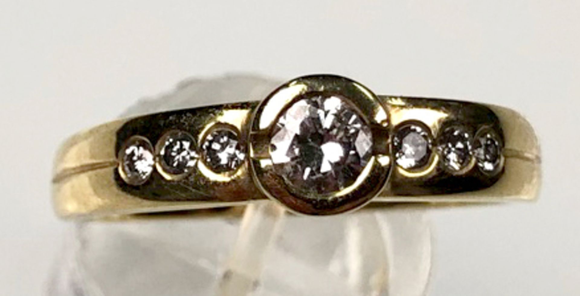 Ring gold 585. Central diamond / brilliant. Approximately 0.25 carat.