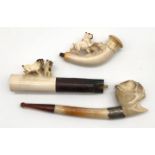 3 meerschaum pipes with pug. One with a case. Probably 120 - 180 years old