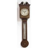 Wall clock with thermometer. "J. Somalvico Co. London".