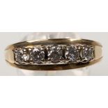 Ring 585 gold. 5 brilliant cut diamonds. About 0.5 carat together.